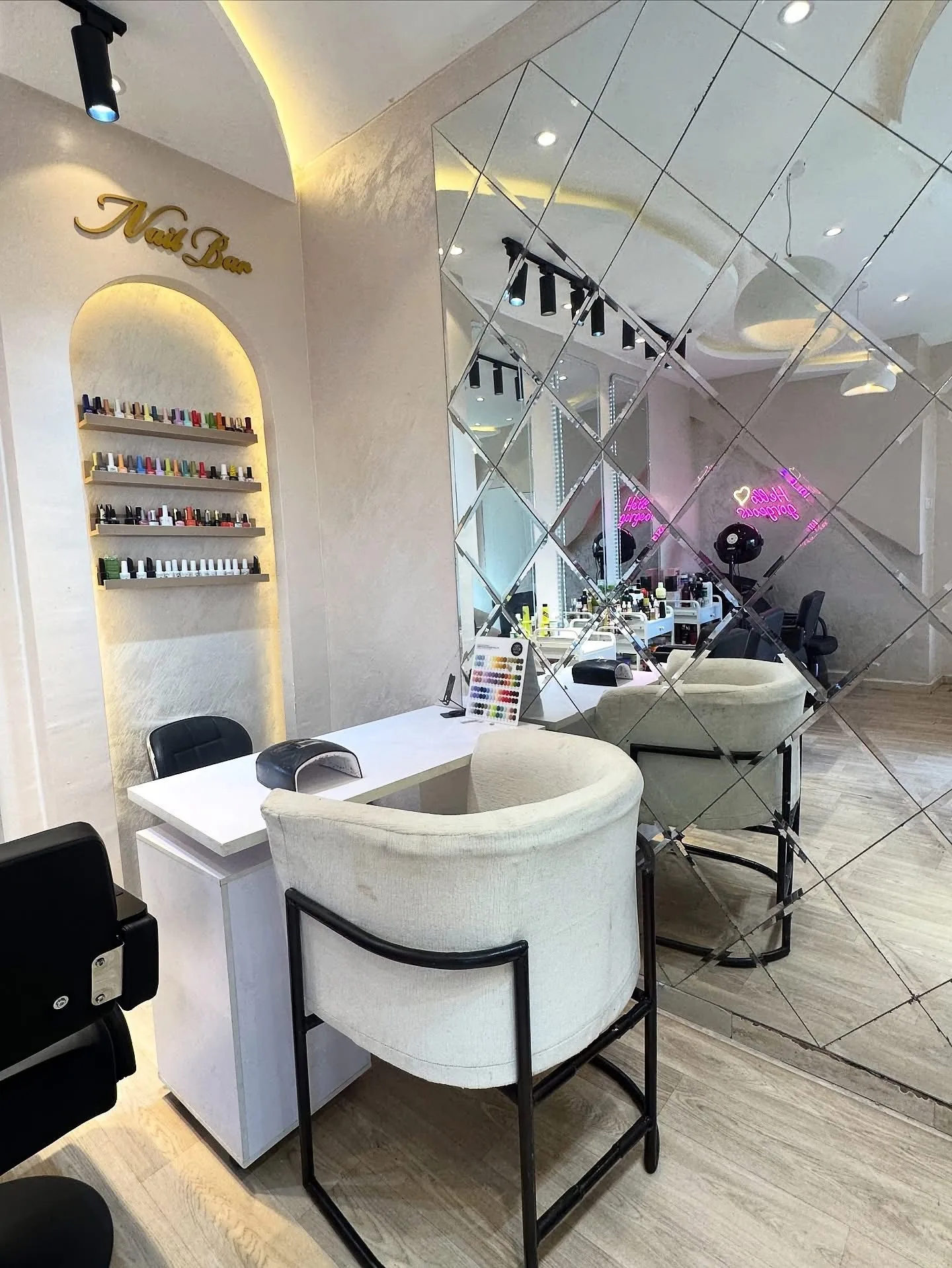 Diamond patterned mirror wall reflecting the expansive space