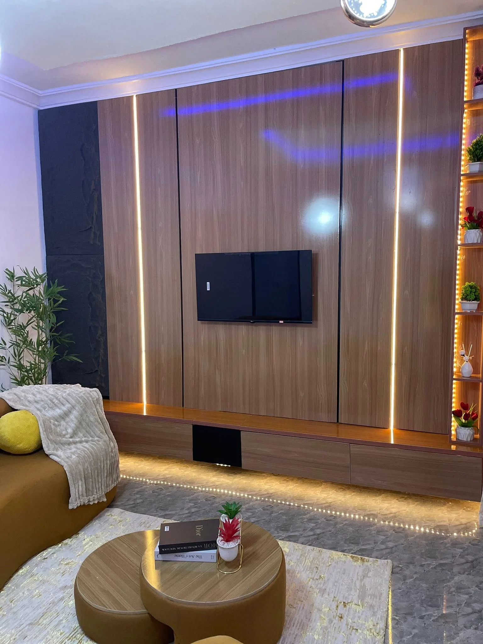 The Void Lounge - Custom wood-paneled TV media wall